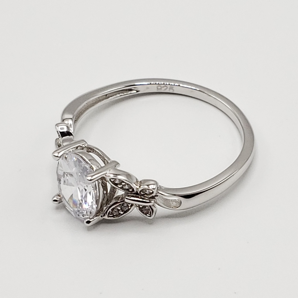 Oval Cut Clear CZ Ring with Butterflies